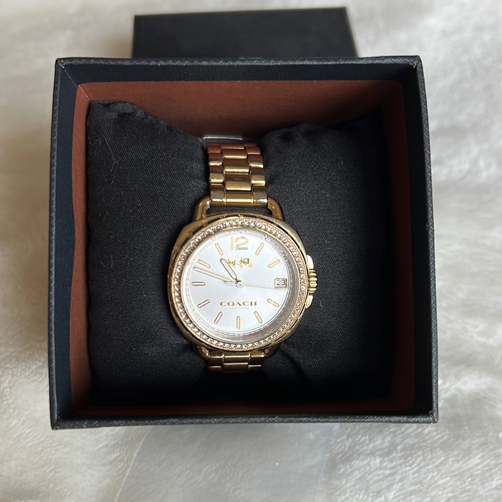 Gold coach watch
